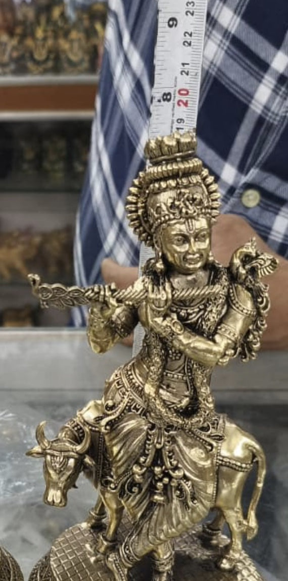 Second piece of the same Krishna with cow statue